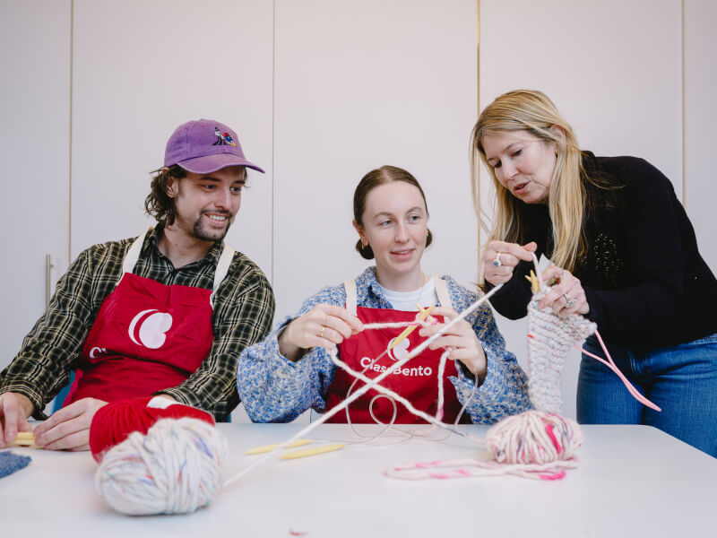 couple at a knitting class